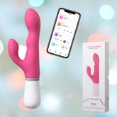 A Lovense Nora Bluetooth-Controlled Rabbit Vibrator in pink is displayed next to a smartphone showing its control app and its packaging. This vibrator, designed for targeted G-spot and clitoral stimulation, syncs with music for an enhanced experience. The packaging features the product image and name in a pink hue.